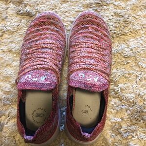 APL a pink slip on sneakers